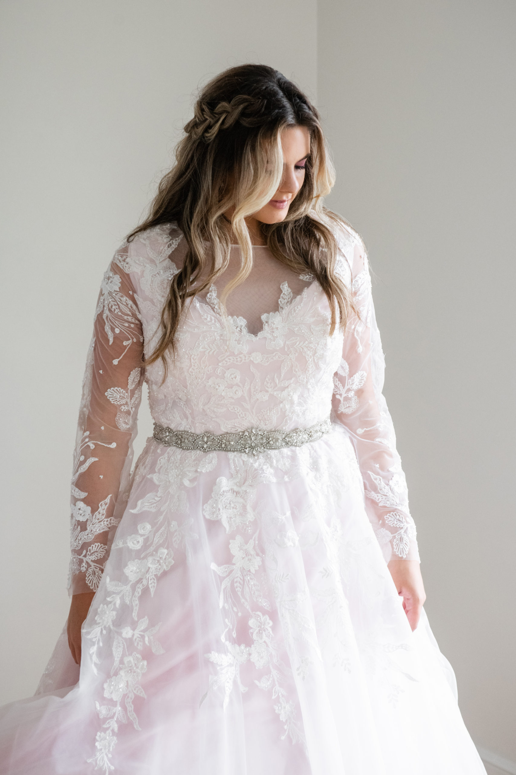 try your plus size wedding gown on | andi b bridal